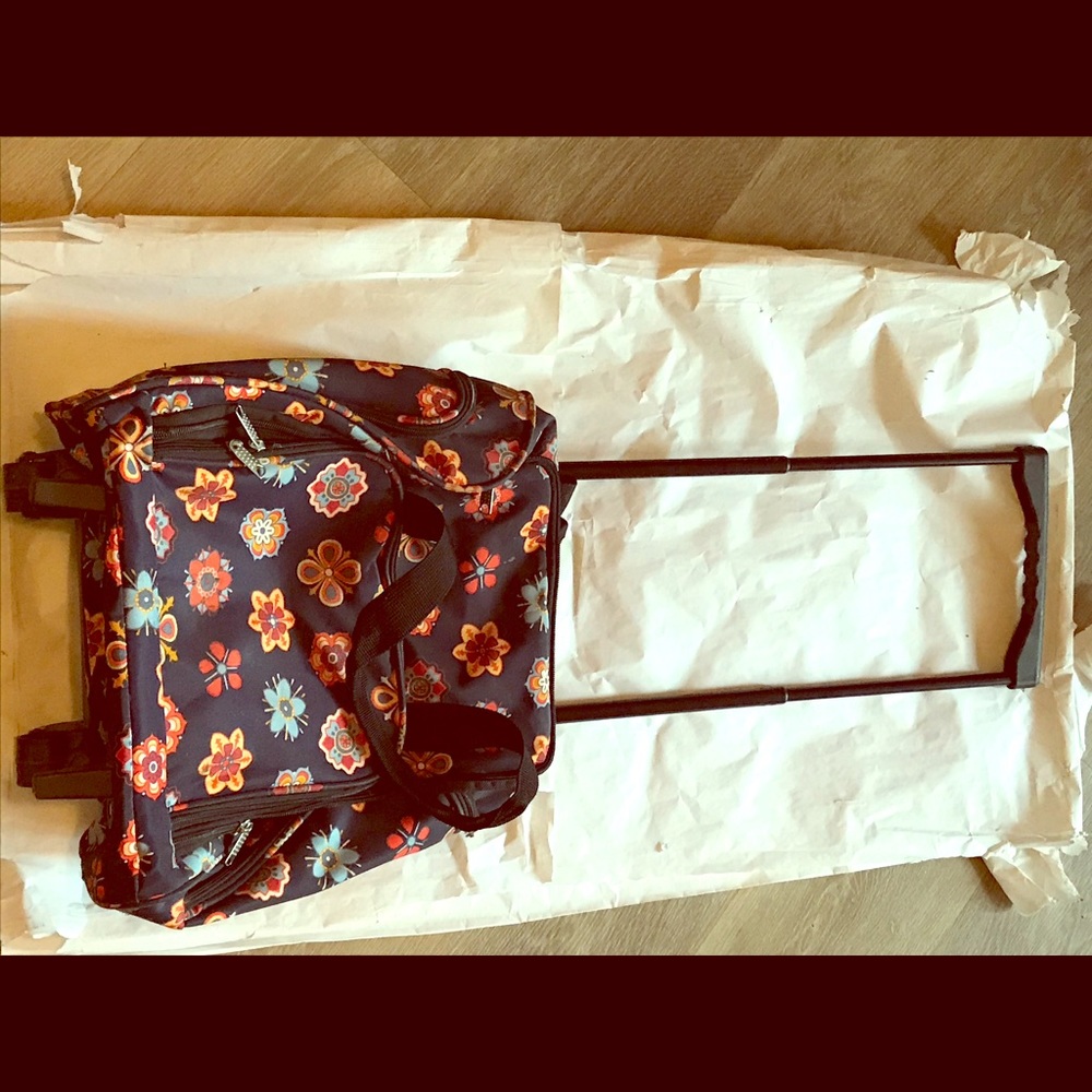 Vera Bradley travel bag and cross body bag